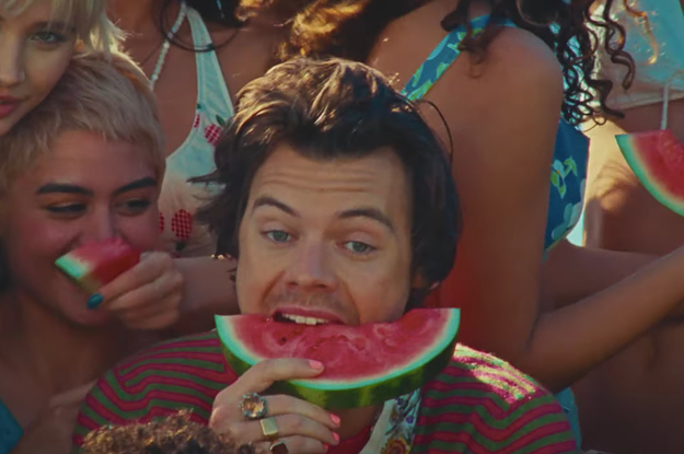 Harry Styles eating a slice of watermelon in the Watermelon Sugar music video