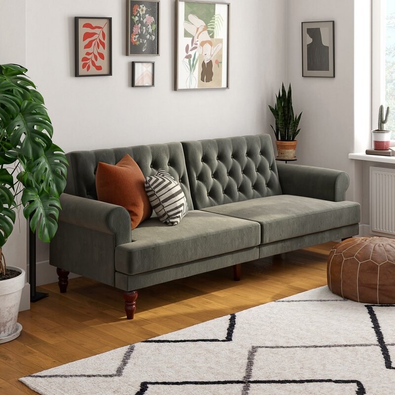 Gray tufted couch