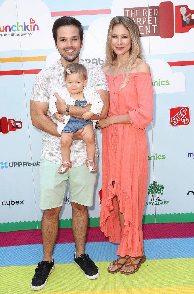 Nathan, London, and Rosie at an event