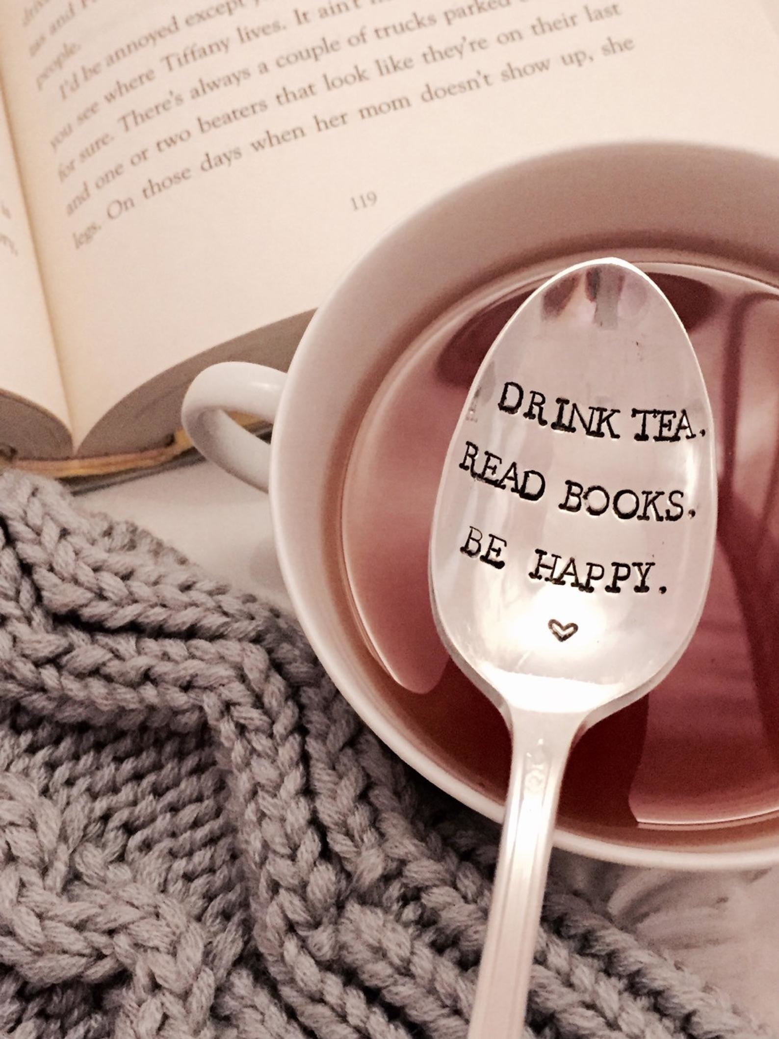 Silver teaspoon with the words &quot;drink tea. read books. be happy&quot; and small heart design 