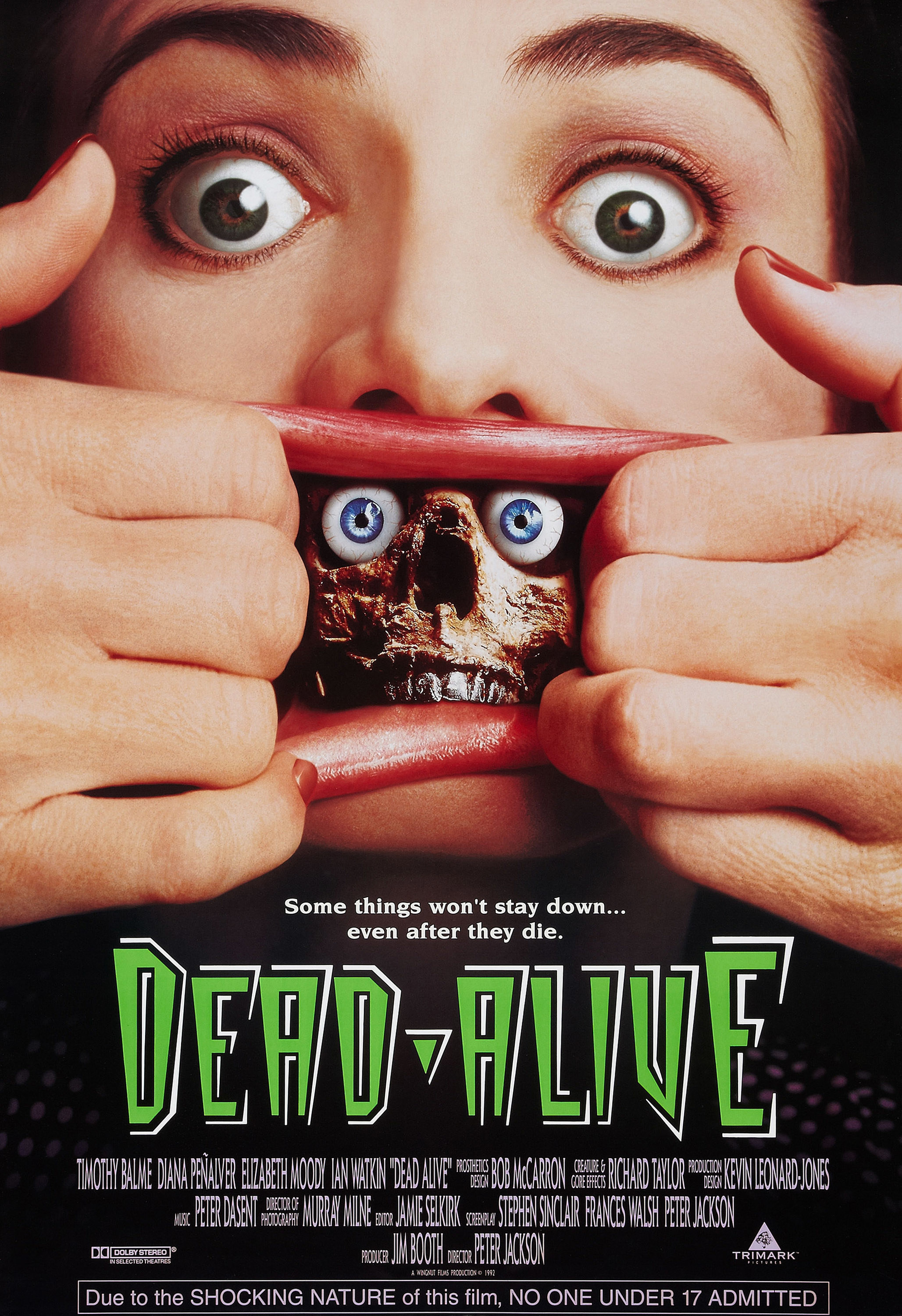 The &quot;Dead-Alive&quot; official poster featuring a woman opening her own lips wide using her hands to reveal a horrifying skeleton inside