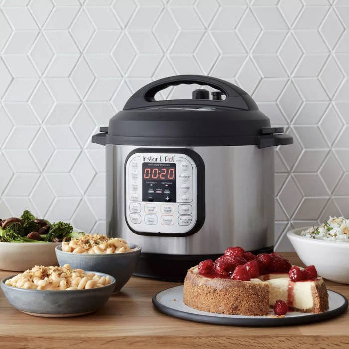 A silver and black instant pot pressure cooker