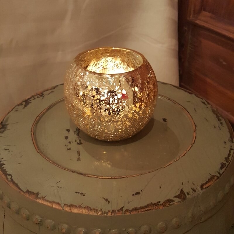 Gold votive candle holder