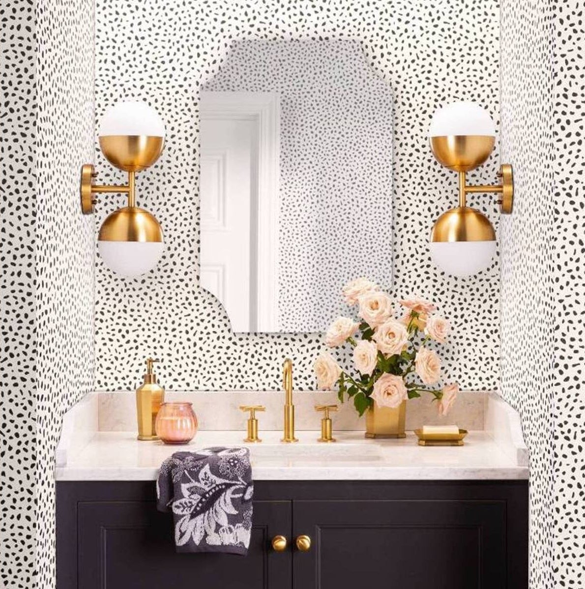 The spotted wallpaper on bathroom walls 