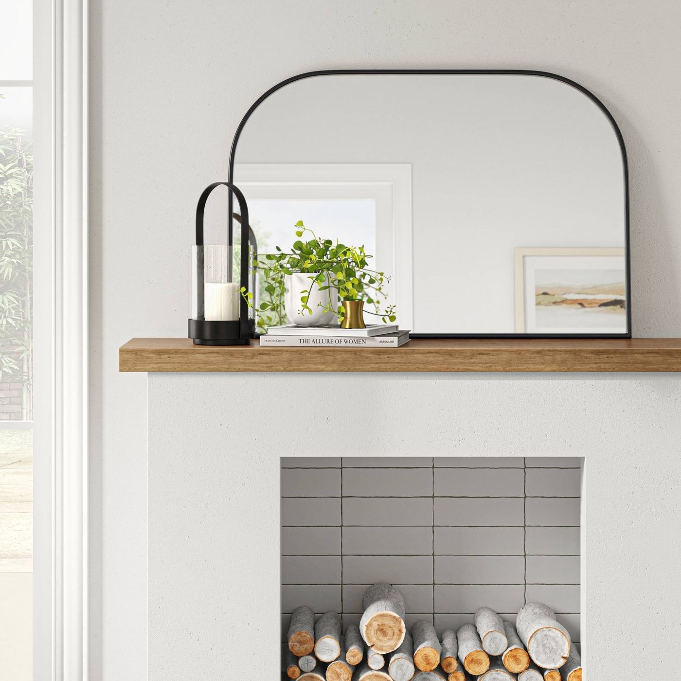 The mirror above a mantel