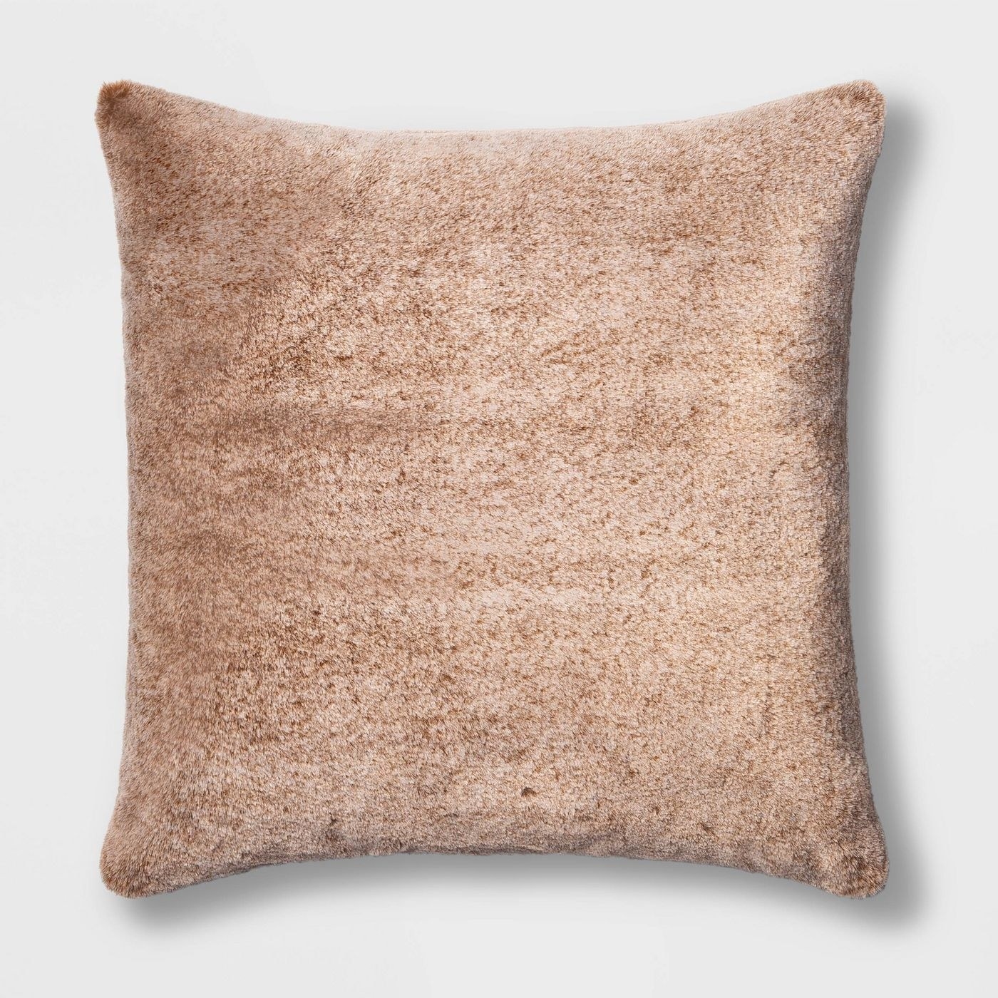 The brown faux fur pillow 