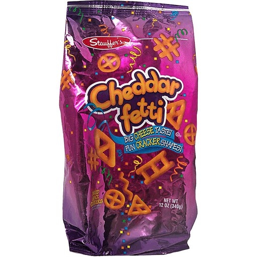 A pink and purple foil bag of Cheddarfetti snack crackers, which are tiny cheese-flavored crackers in different geometric shapes