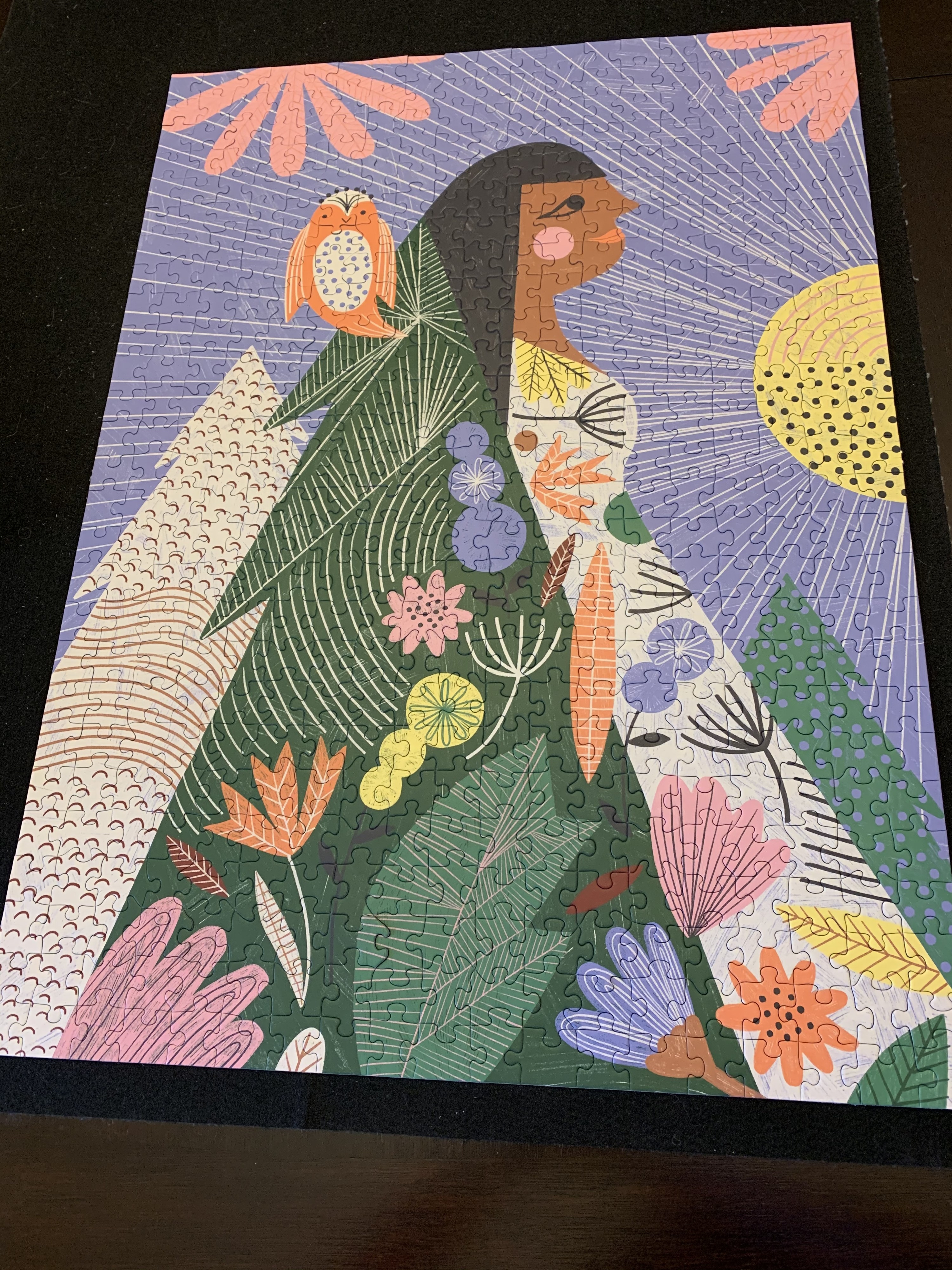 the forest walk puzzle featuring a woman walking through an array of flowers