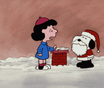 a gif of snoopy dressed as santa bopping lucy on the nose with a horn