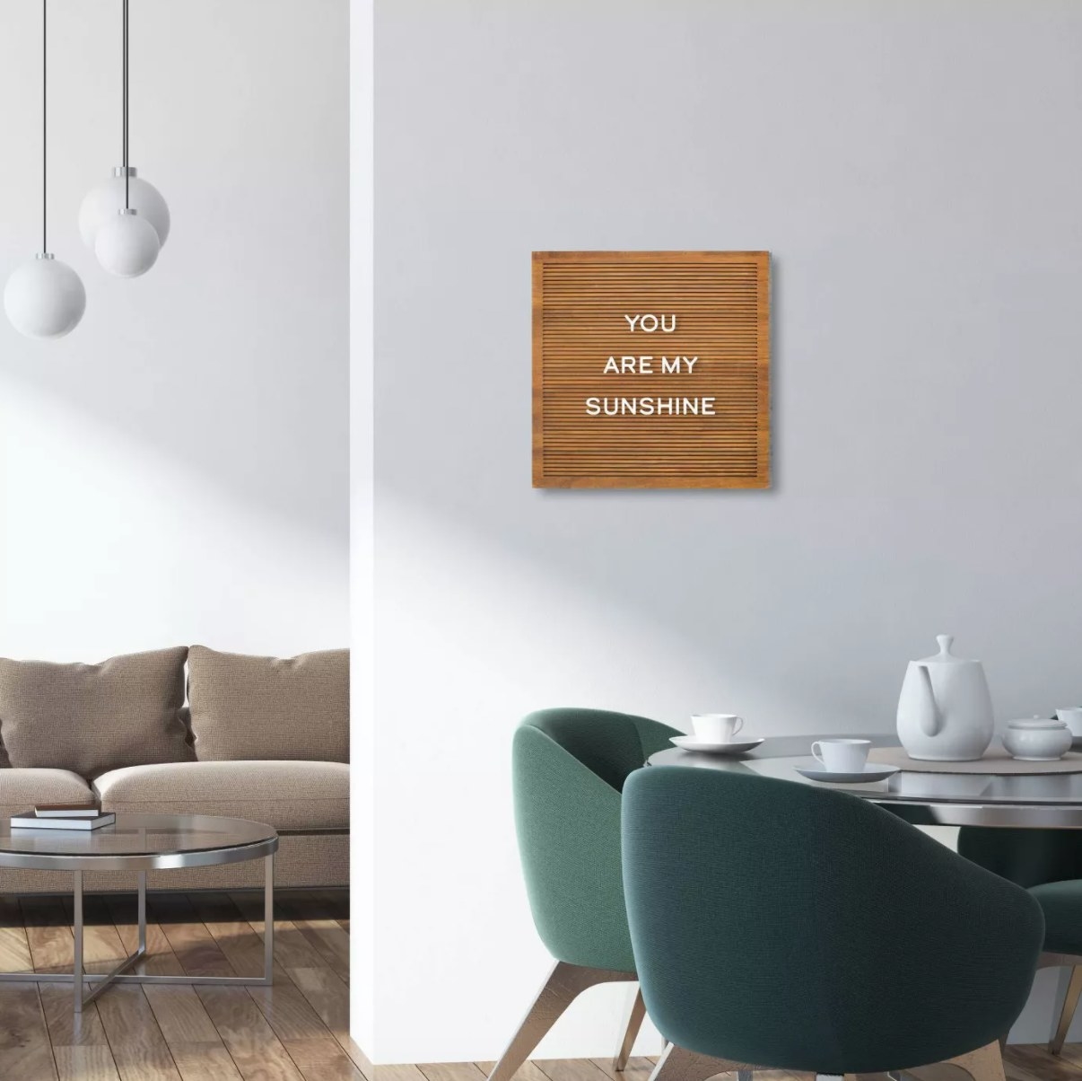 A wooden letter board with the message "you are my sunshine"