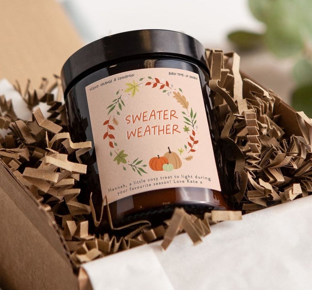 The sweater weather candle in a box