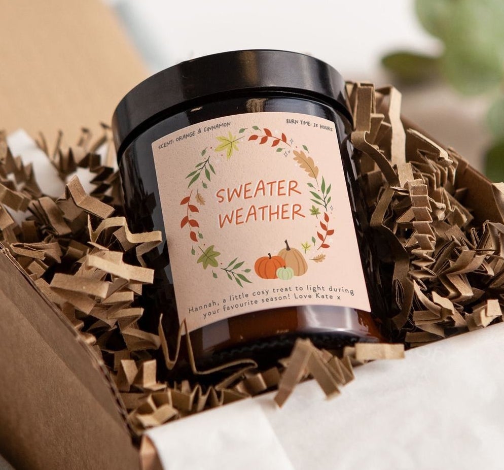 The sweater weather candle in a box