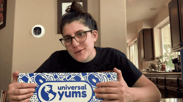 A gif of one of the testers pointing to the universal yums box.