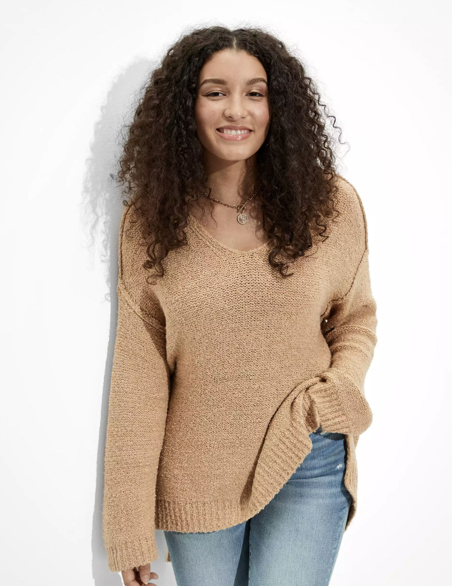 A model wearing the sweater