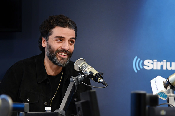 Oscar Isaac taking part in a radio interview 
