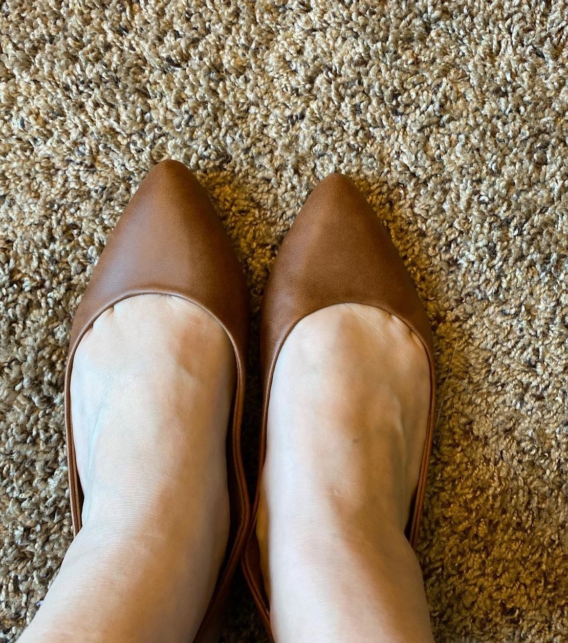 reviewer&#x27;s wearing the brown flats
