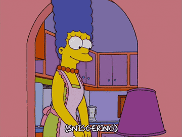 Marge from &quot;The Simpsons&quot; laughing into her hand