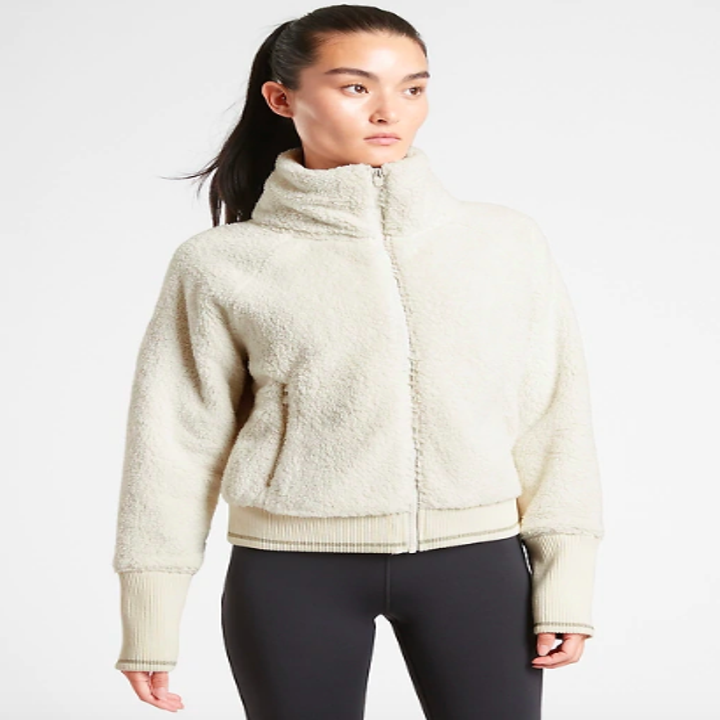 Model wearing jacket in white