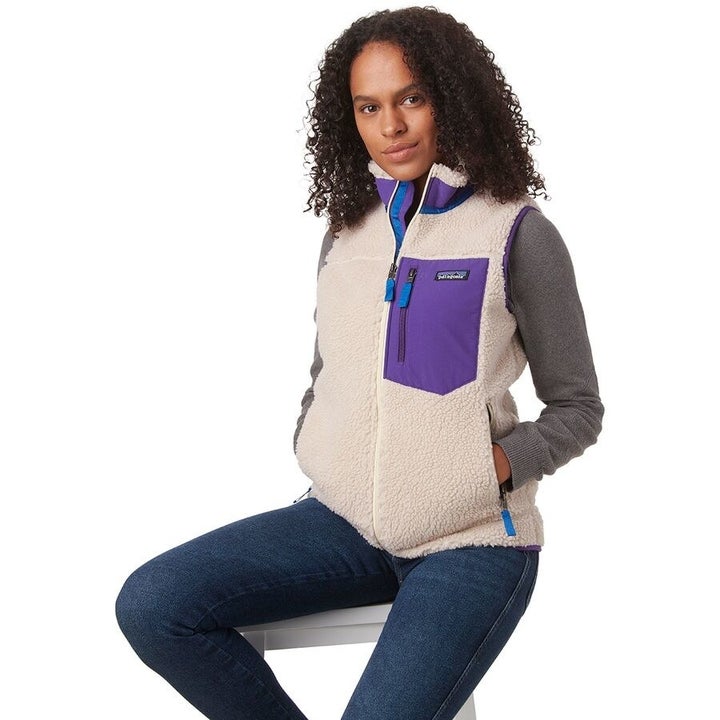 Vest in white with large purple breast pocket 