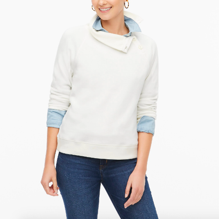 Same sweater in white worn over collard shirt 