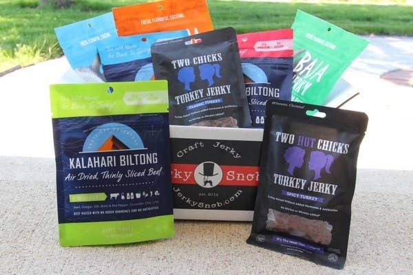 an unpacked box of jerky in many varieties