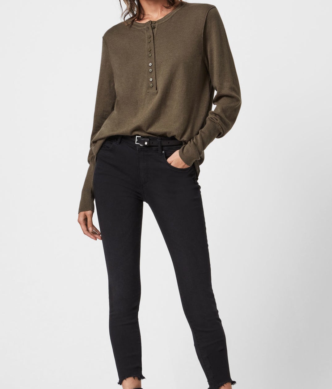 olive long sleeve top with buttons that go half way down the neckline 