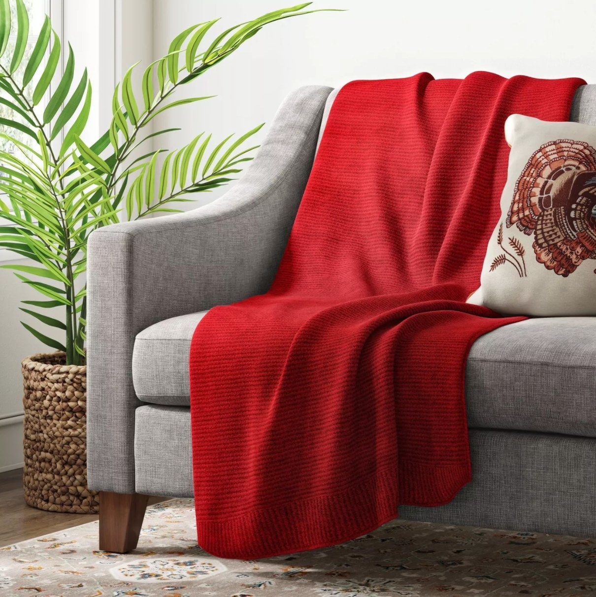 The knit throw blanket in red