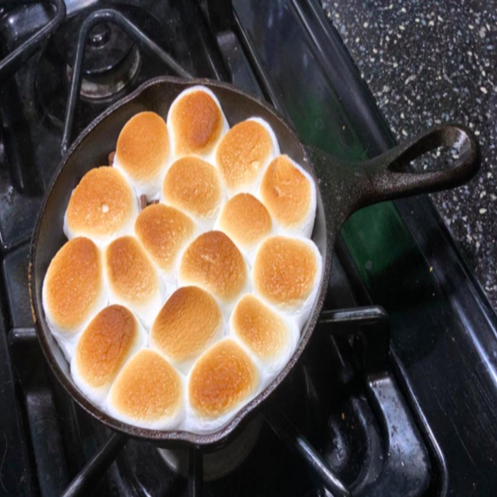 A reviewer photo of s'mores dip that was cooked in the pan