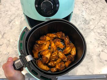A reviewer photo of chicken wings they made in the air fryer