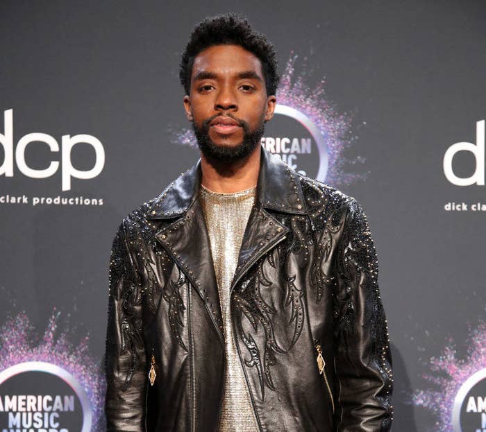 Chadwick Boseman poses in the press room during the 2019 American Music Awards