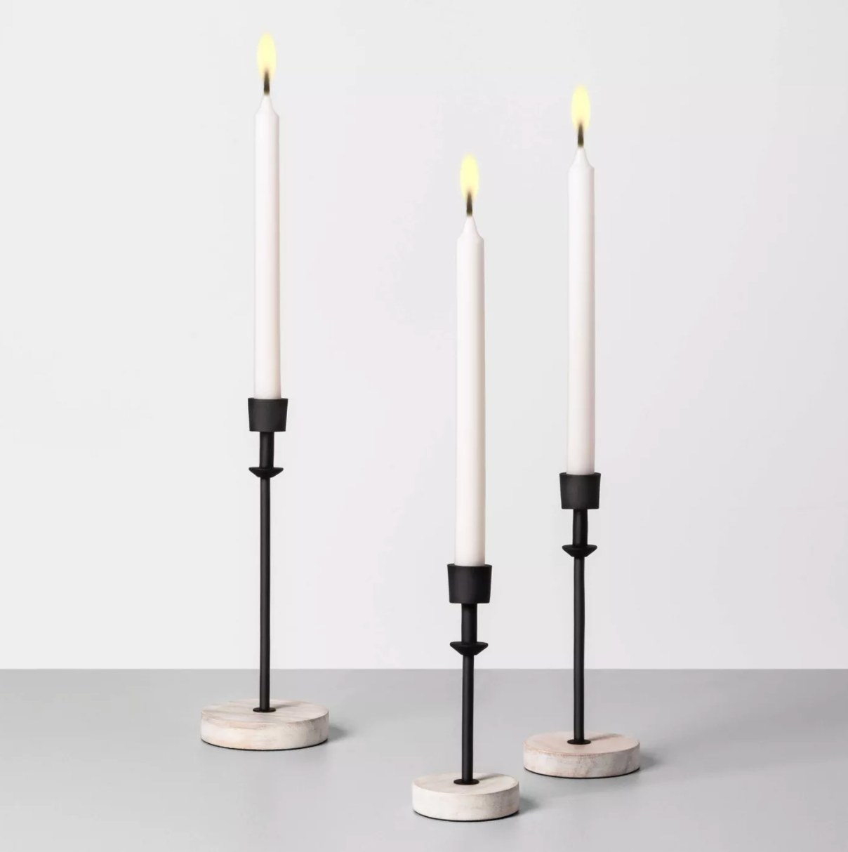 The single wood and metal candle holder