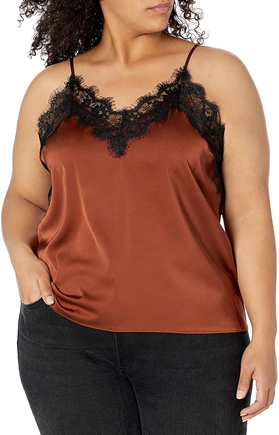 model wearing the orange tank with black lace 