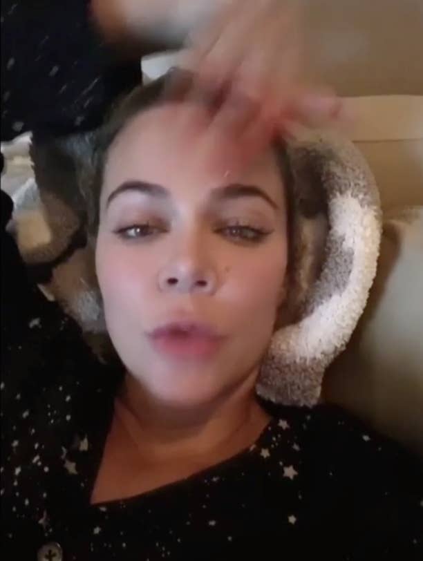 Khloé addressing a camera