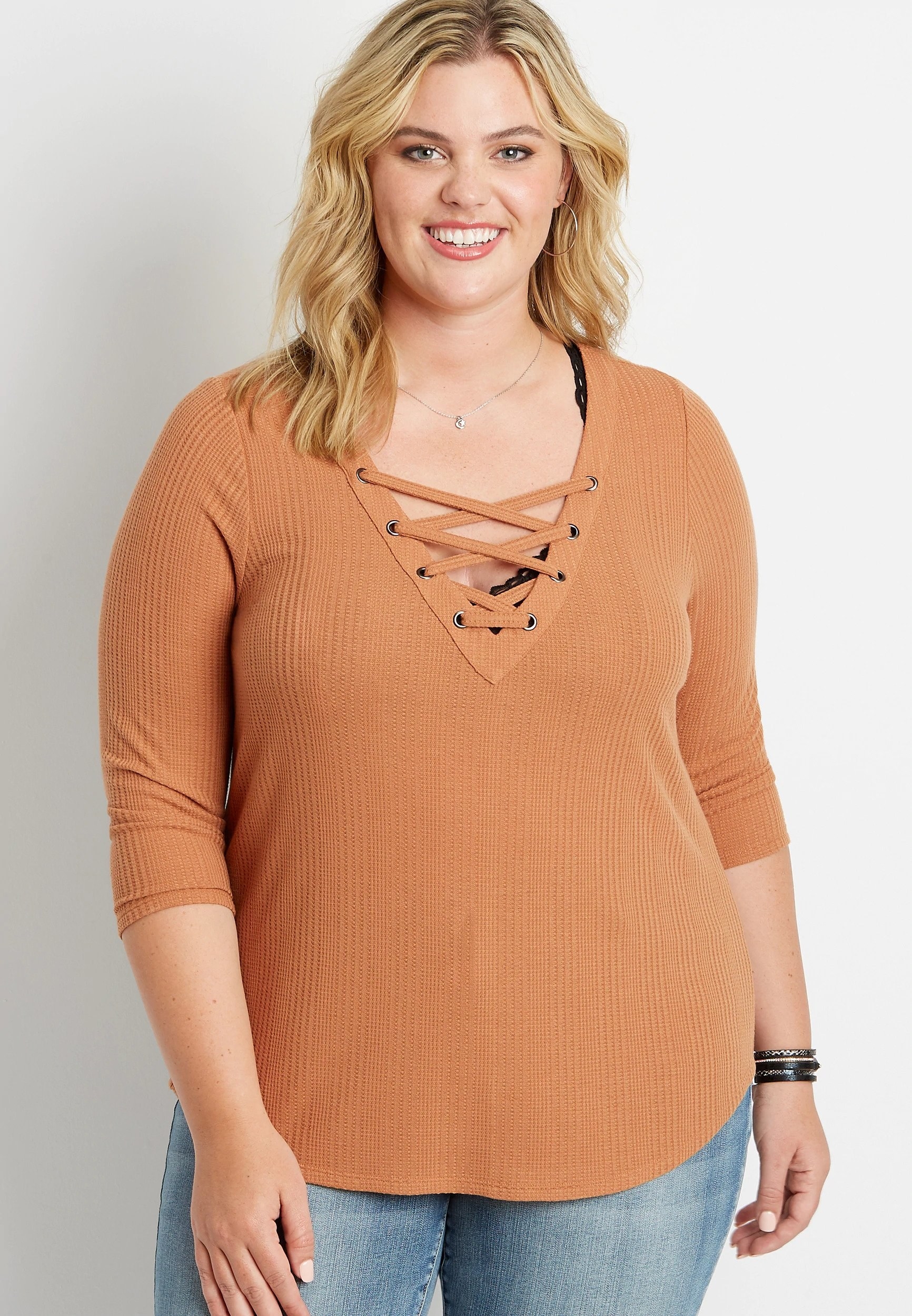 v neck top with criss cross lacing neckline 