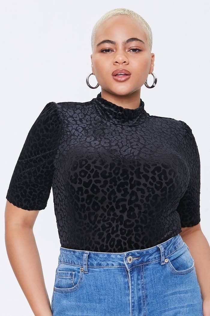 black short sleeve top with high neck and black leopard print