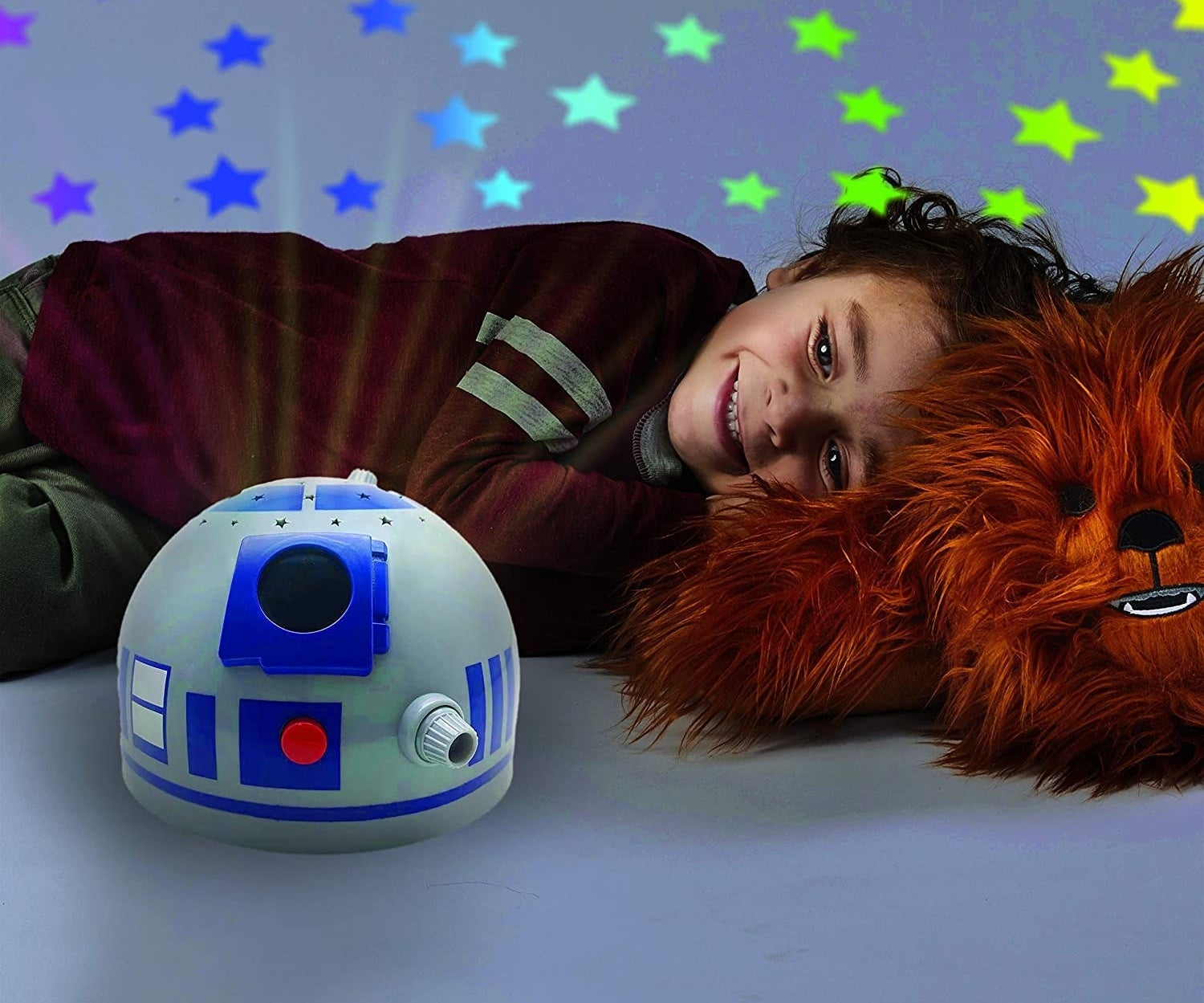 Child model with R2D2 light up pillow