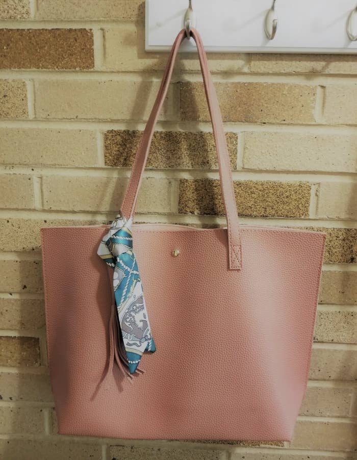 reviewer photo of the pink tote bag 