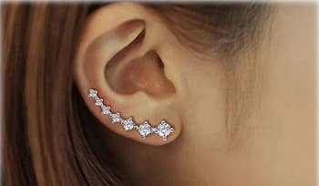 The earrings on someone's ears