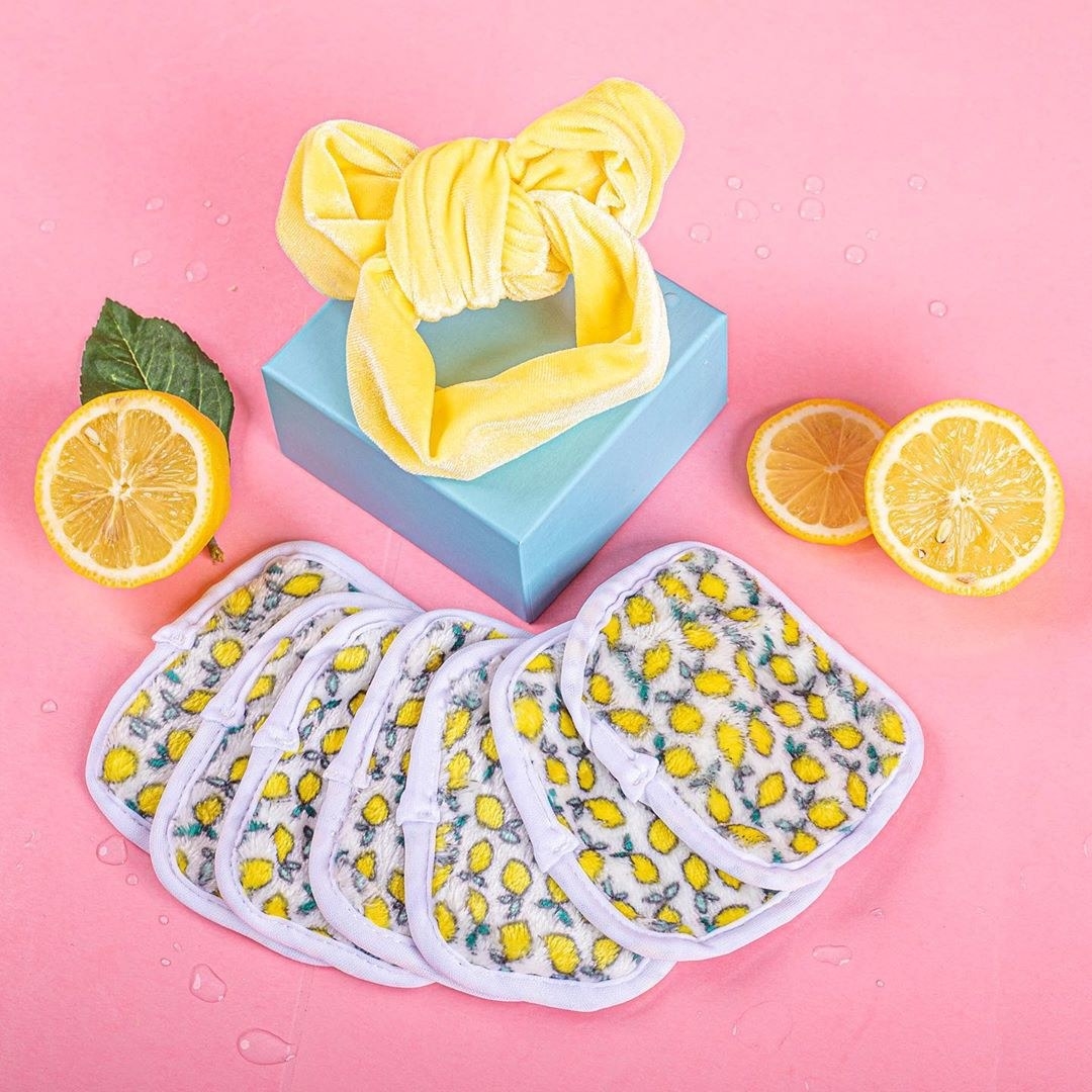 The makeup eraser minis and headband surrounded by lemons