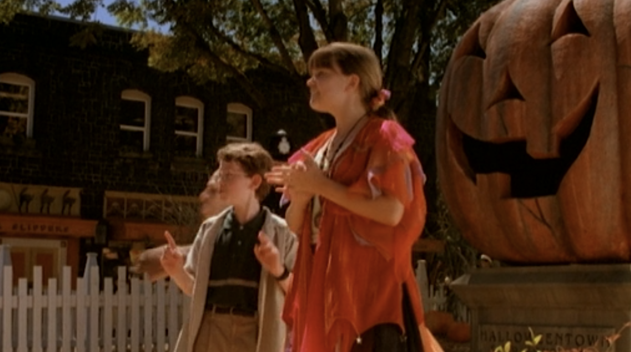 Marnie and Dylan next to the giant pumpkin