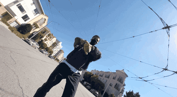 A man dancing while the camera spins clockwise