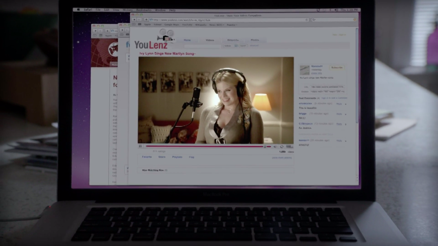 A laptop screen with a tab for &quot;YouLenz&quot; open, playing a video of Ivy singing