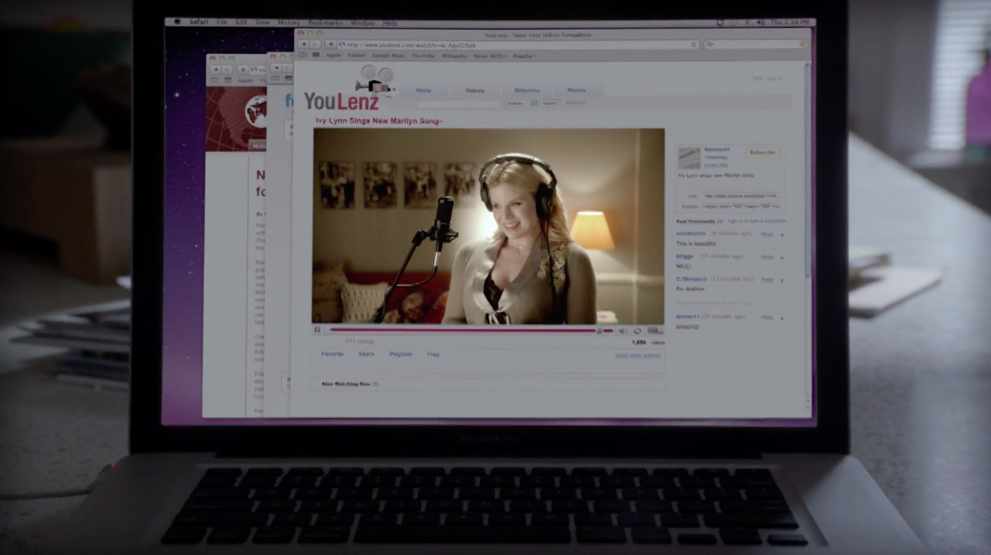 A laptop screen with a tab for "YouLenz" open, playing a video of Ivy singing