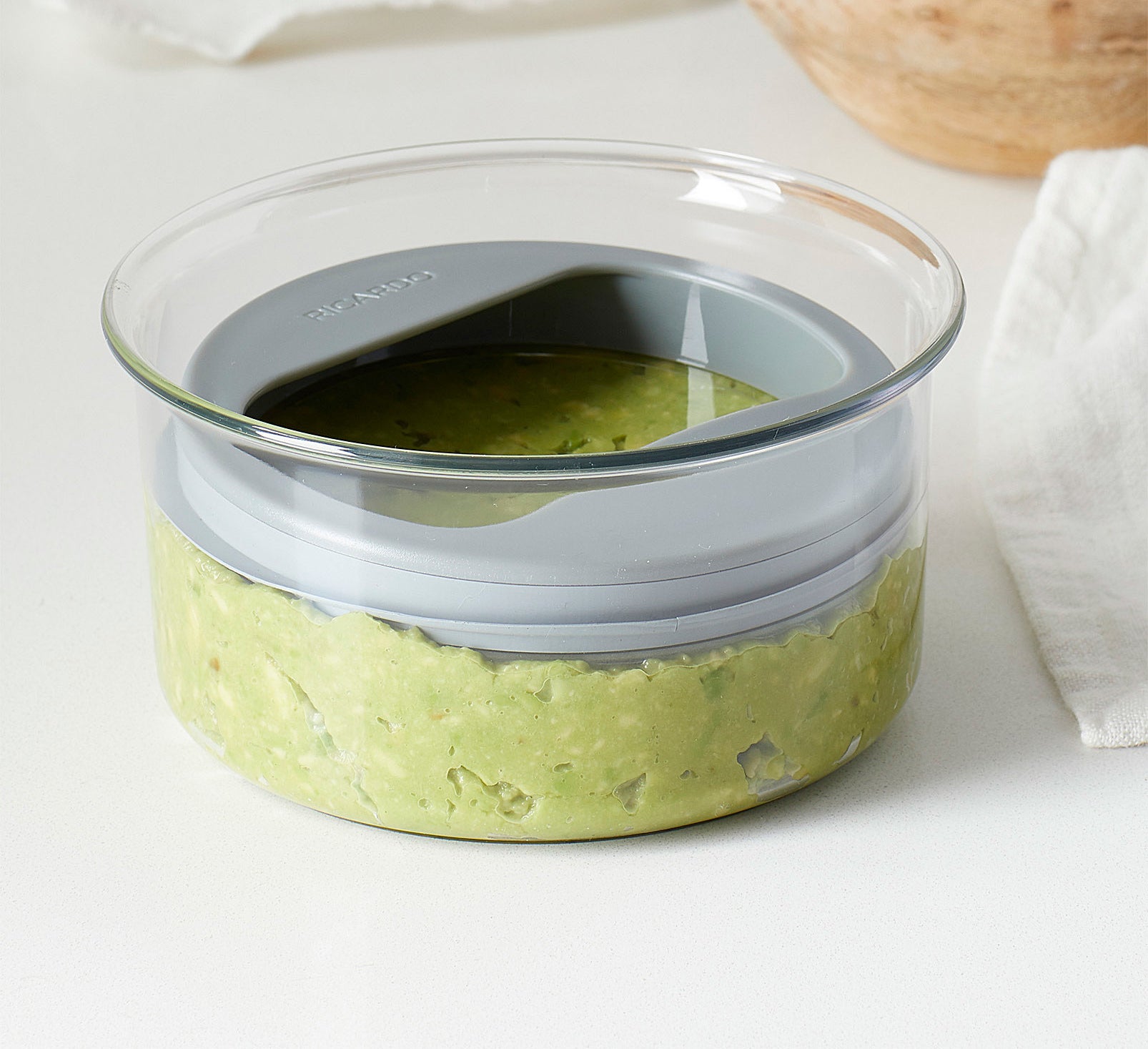 A container with guacamole