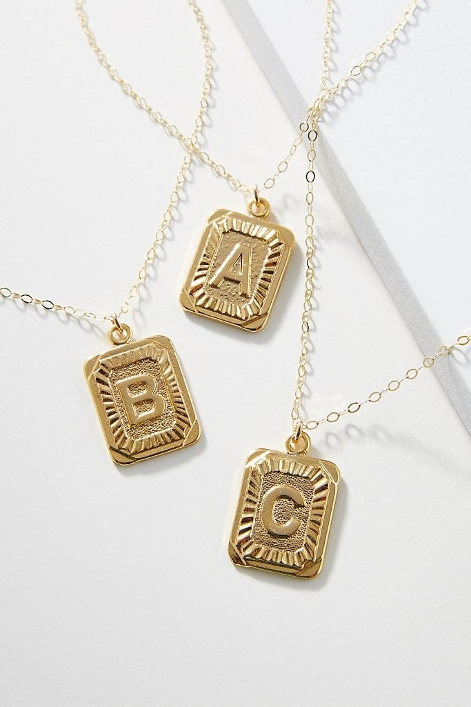 Whim monogram pendant necklaces in letters: A, B and C