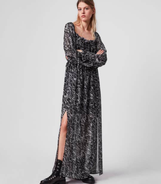the dress with an animal print and a slit up the leg to about the knee area