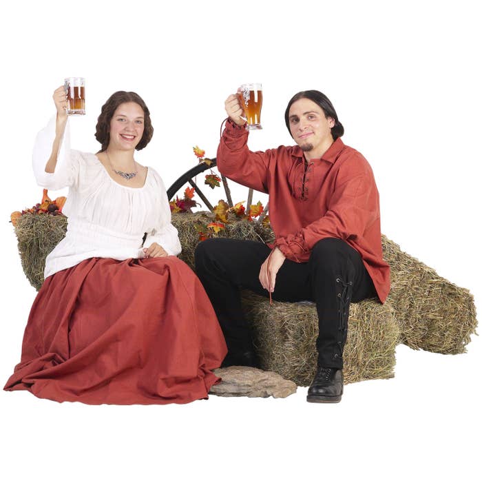Two peasants toasting with glasses of ale