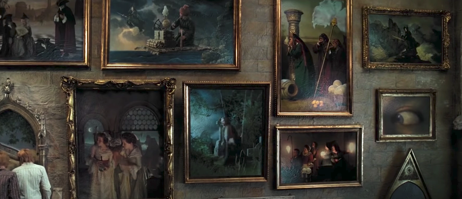 Large portraits hanging in the Hogwarts staircase