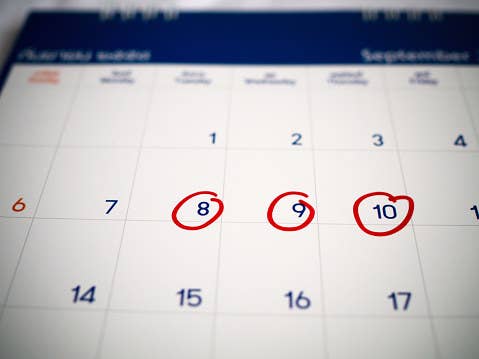 Calendar with days circled in red.