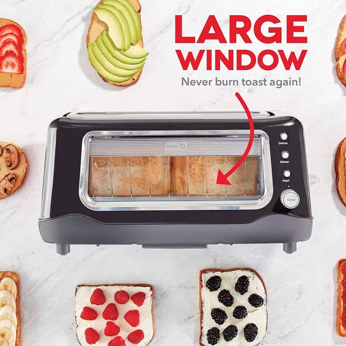 The toaster in black with text that says &quot;large window. never burn toast again!&quot;